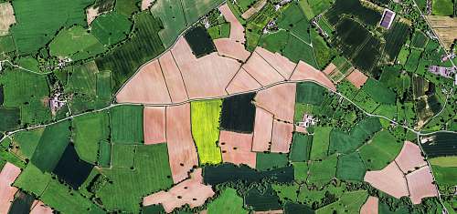 landscape aerial view of green and black fields nature
